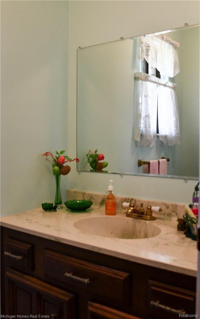 5302 West Dodge Road Clio, MI 48420 - Photo 41 of 77 SPARKLING 1/2 BATHROOM - SO CONVENIENT FOR GUESTS