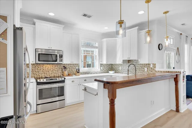 $705,000 | 215 Silver Sloop Way, Carolina Beach, NC 28428