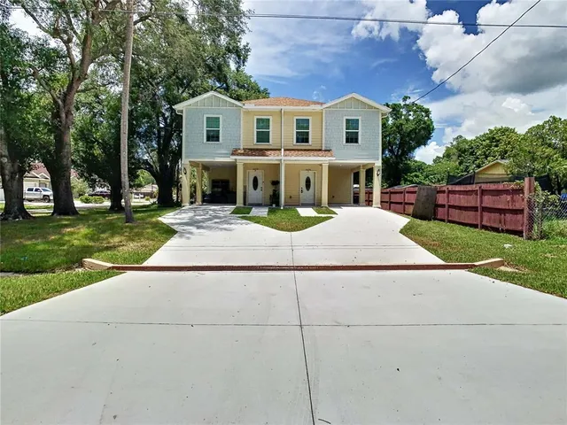 front view of a house with a yard