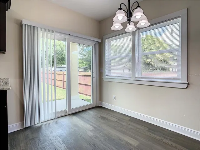 a view of a hallway with staircase