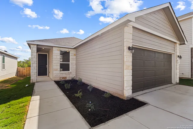 a view of a back yard of the house