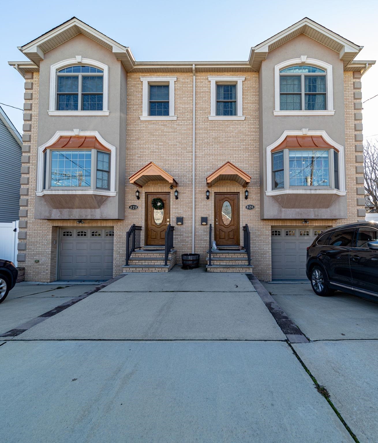 826 Eighth Street Secaucus, NJ 07094 - Photo 12 of 12 a couple of cars parked in front of a building