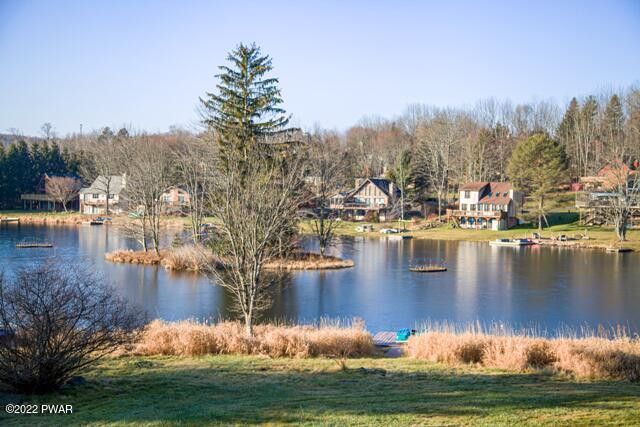 a view of a lake with trees
