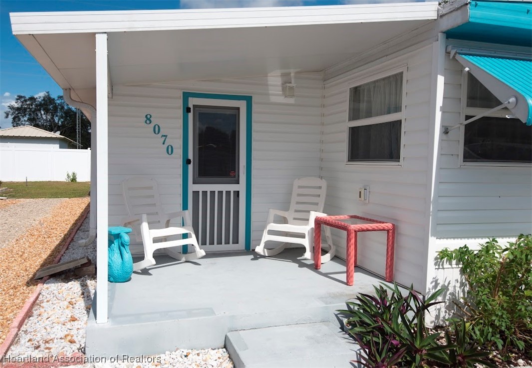 8070 Von Maxcy Road Sebring, FL 33870 - Photo 3 of 25 Open side porch.