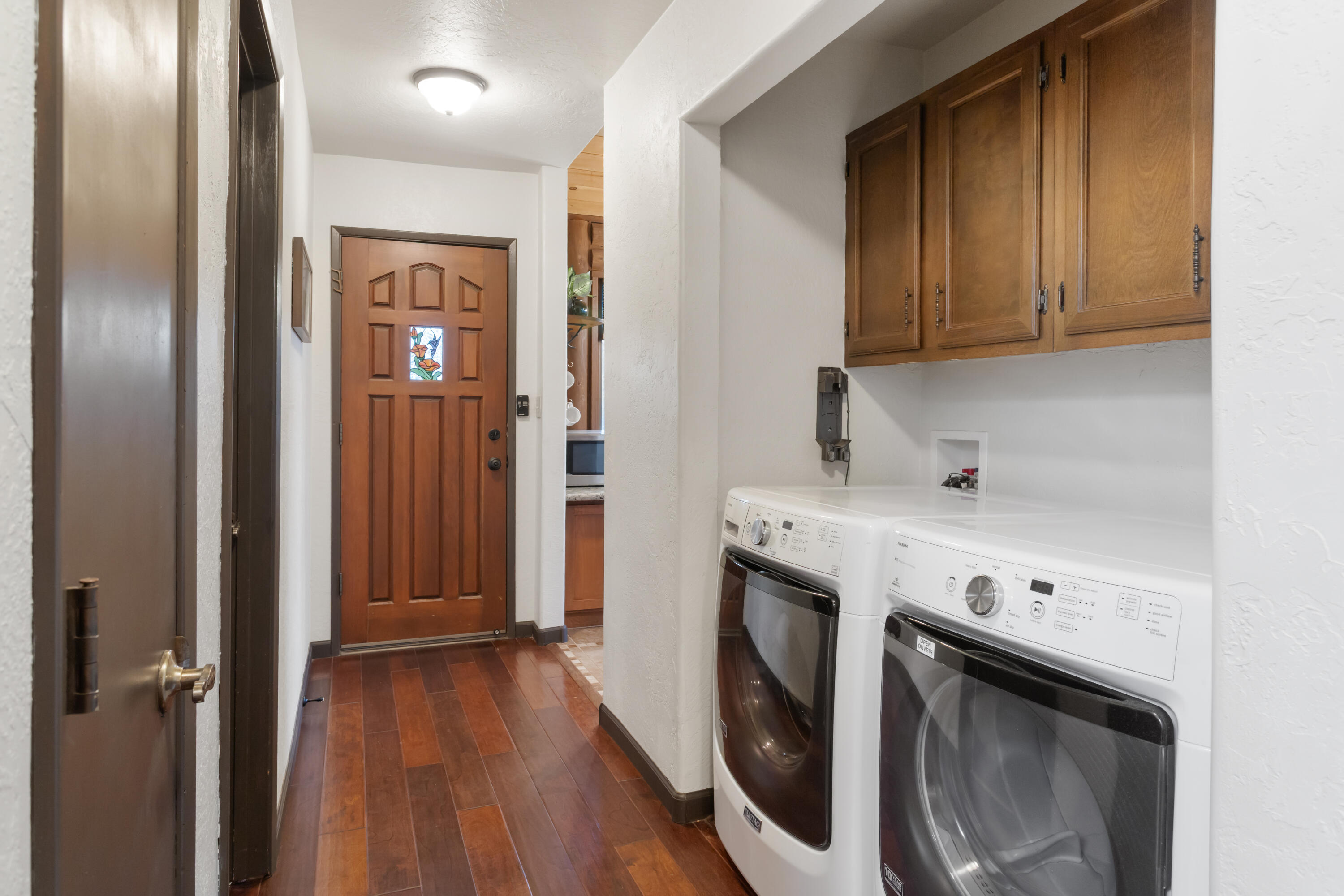 19606 Fish Hill Lane Redding, CA 96003 - Photo 15 of 24 a view of a kitchen with washer and dryer