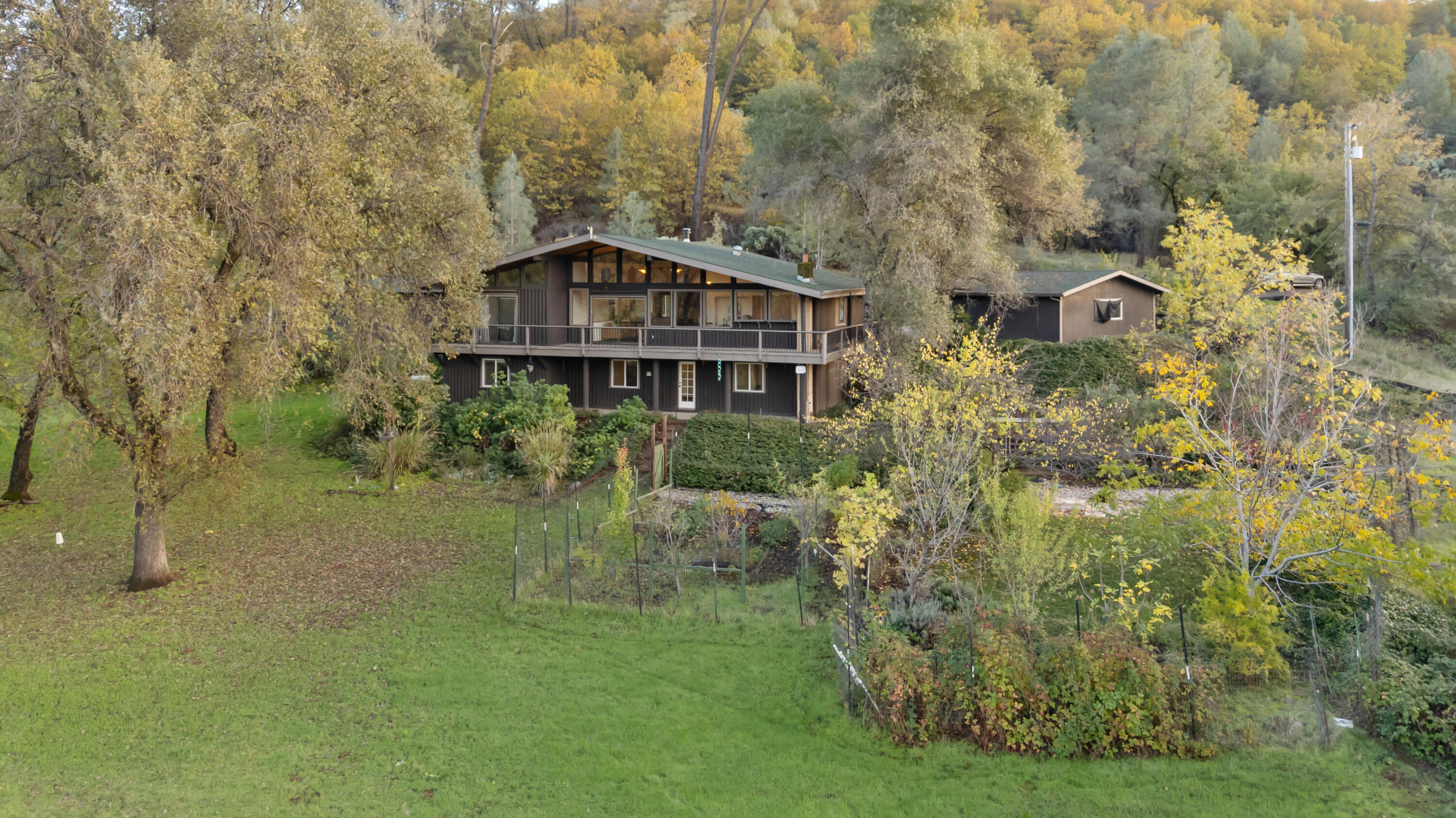 19606 Fish Hill Lane Redding, CA 96003 - Photo 23 of 24 a aerial view of a house next to a yard
