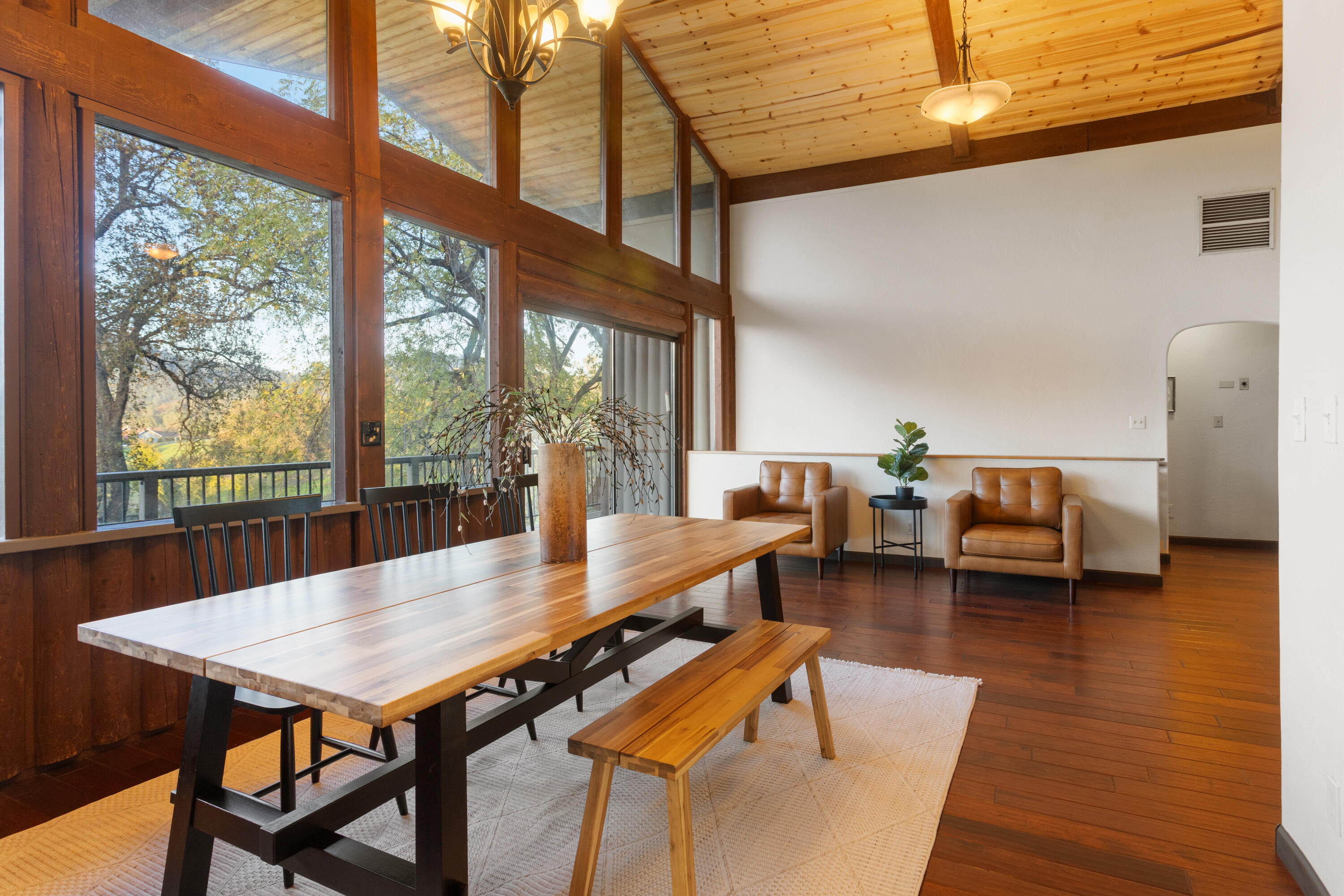 19606 Fish Hill Lane Redding, CA 96003 - Photo 8 of 24 a dining room with furniture and wooden floor