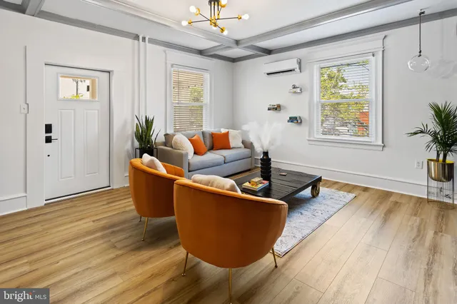 a living room with furniture and a couch