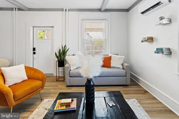 a living room with furniture and a couch