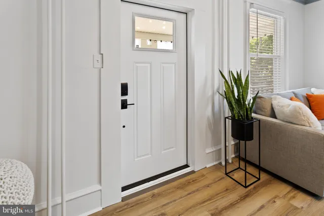 a living room with wooden floor