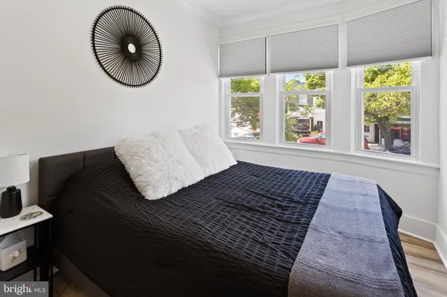 a kitchen with granite countertop a stove and a sink