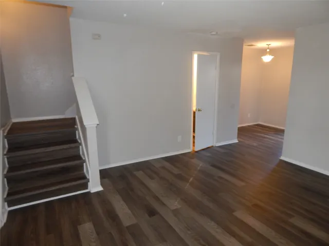 a view of entryway with wooden floor