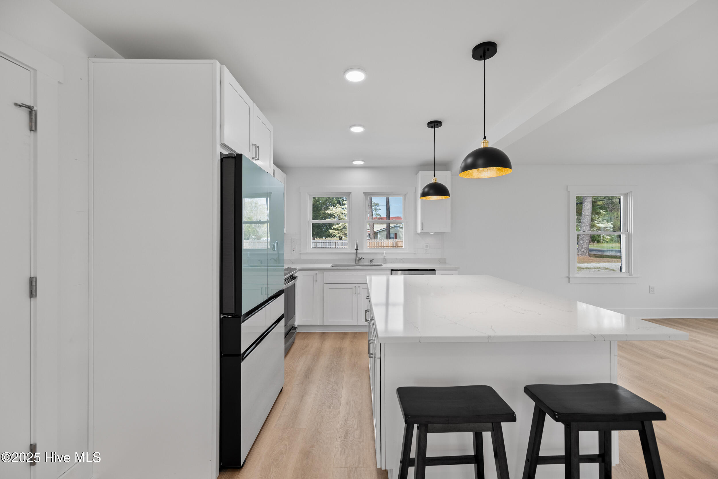 750 Shawboro Road Shawboro, NC 27973 - Photo 9 of 42 Custom made cabinetry and quartz countertops