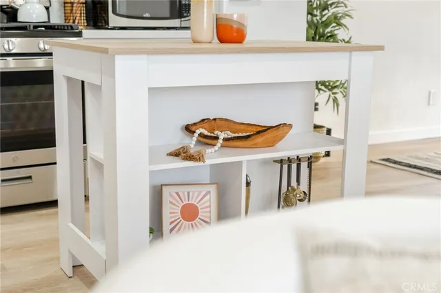 a bathroom with a sink a mirror and a shower curtain