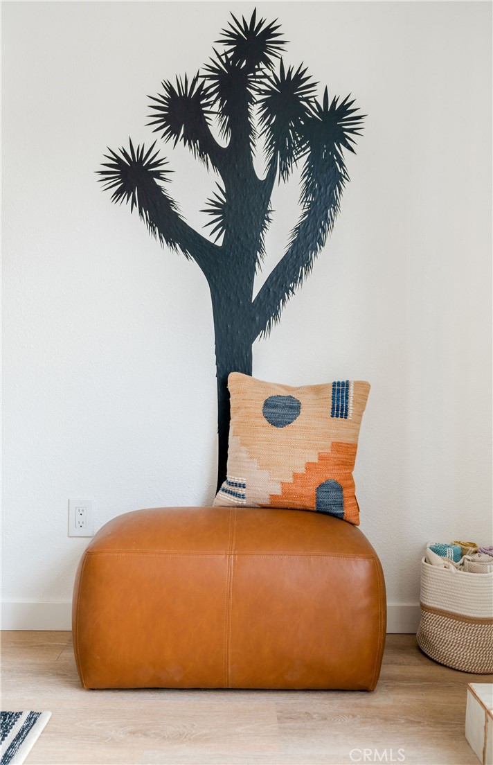 62046 Mountain View Circle Joshua Tree, CA 92252 - Photo 35 of 69 a bedroom with a bed and a potted plant