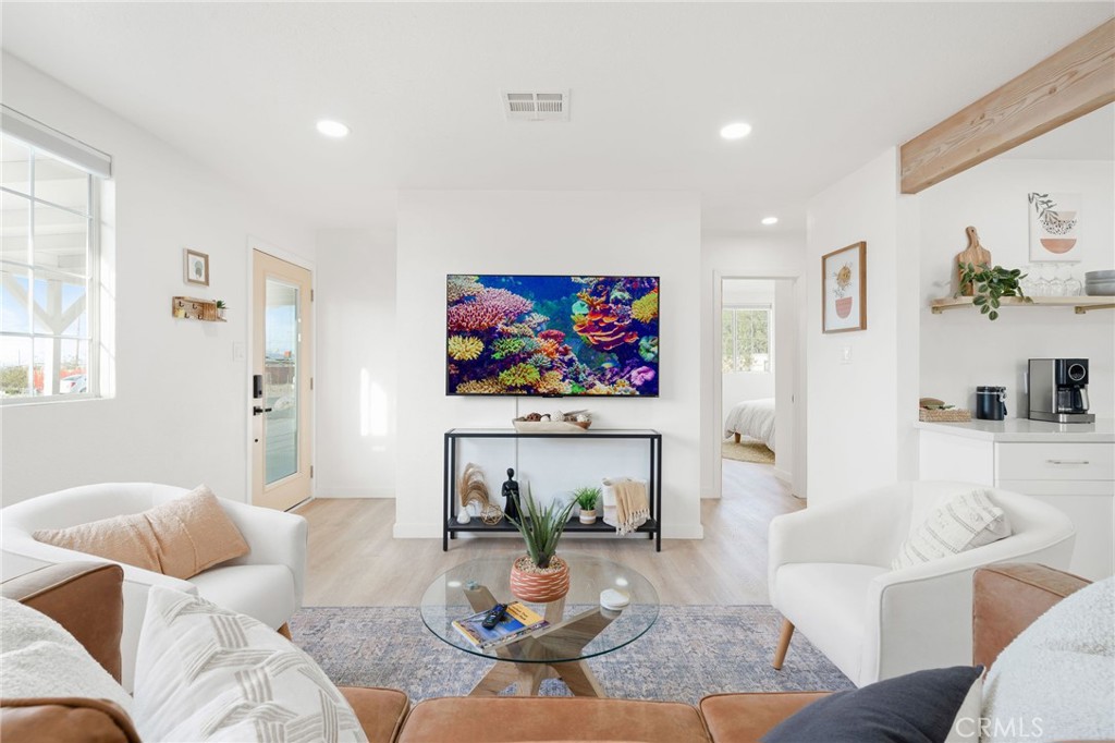 62046 Mountain View Circle Joshua Tree, CA 92252 - Photo 4 of 69 a living room with furniture and a fireplace