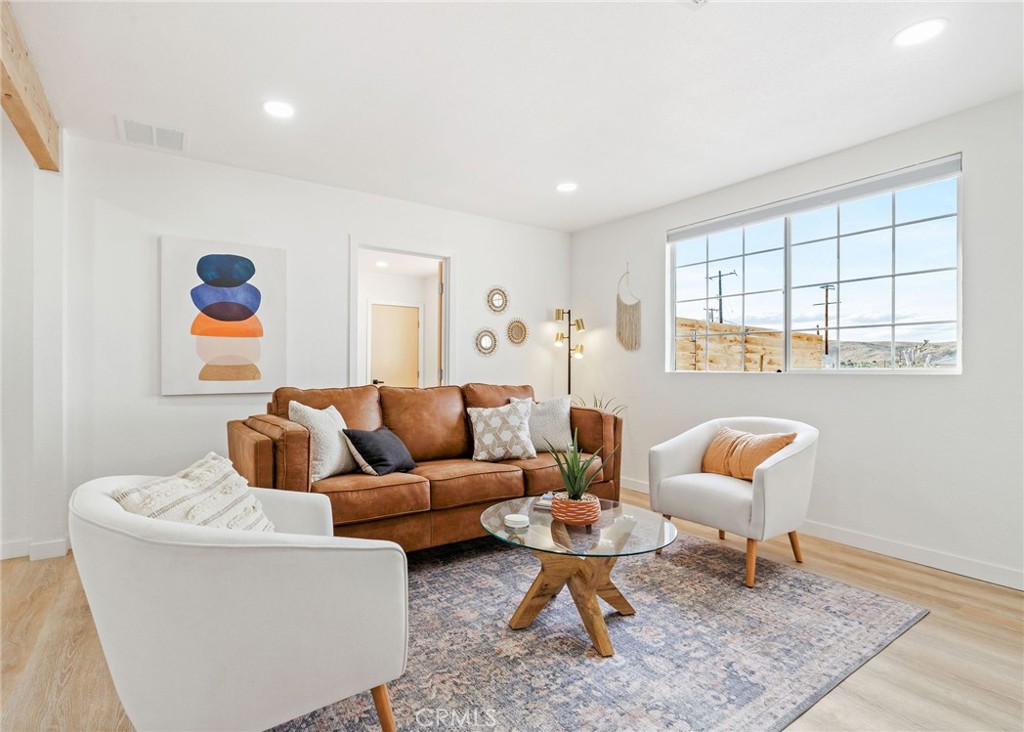 62046 Mountain View Circle Joshua Tree, CA 92252 - Photo 6 of 69 a living room with furniture and a window