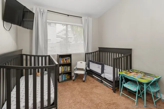 a view of a room with furniture window and hardwood floor