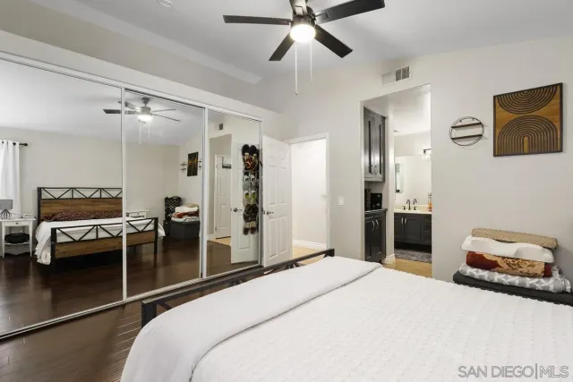 a bedroom with a bed and furniture