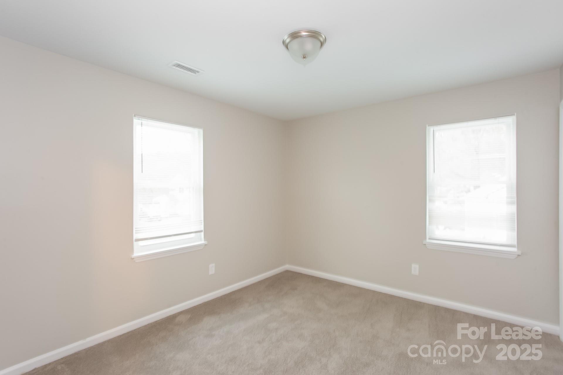 10321 Roundhouse Circle Mint Hill, NC 28227 - Photo 13 of 17 an empty room with a window