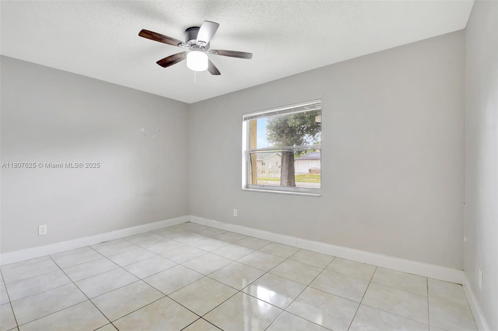 6160 Camp Lee Road West Palm Beach, FL 33417 - Photo 20 of 42 a view of an empty room with a window