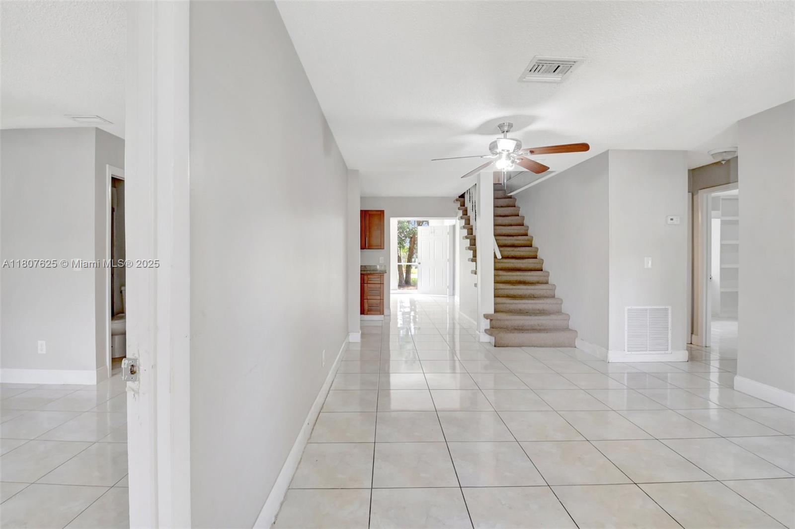 6160 Camp Lee Road West Palm Beach, FL 33417 - Photo 4 of 42 a view of entryway and hall with a window