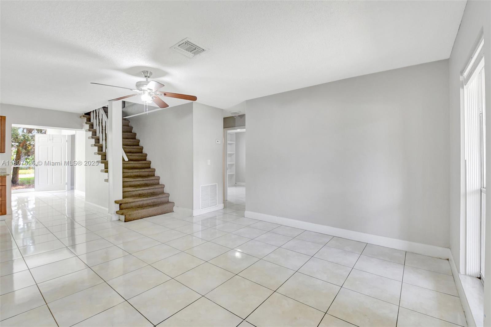 6160 Camp Lee Road West Palm Beach, FL 33417 - Photo 5 of 42 a view of an empty room with stairs