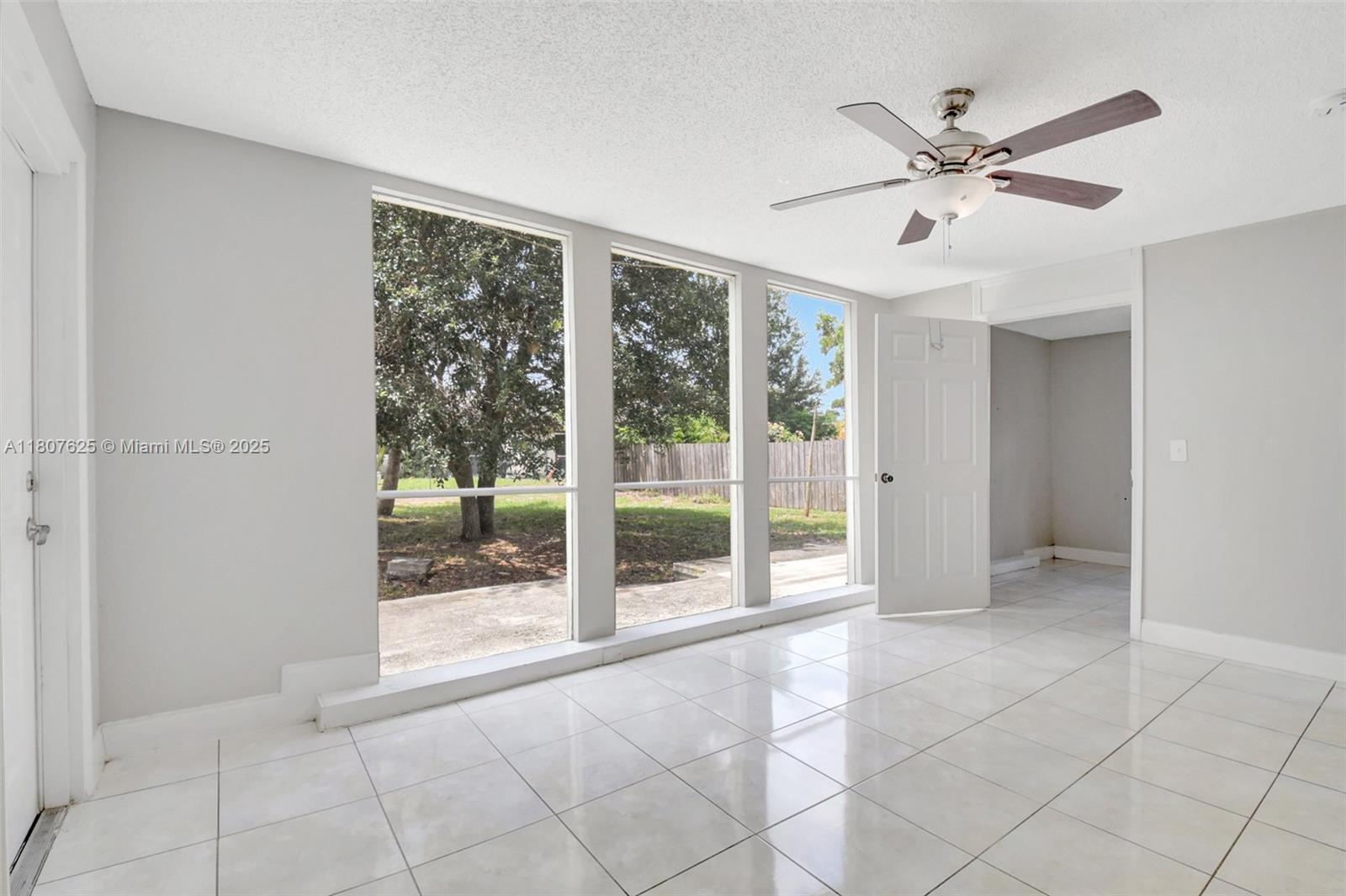 6160 Camp Lee Road West Palm Beach, FL 33417 - Photo 10 of 42 a view of an empty room with a window