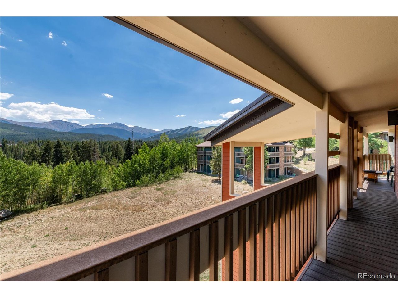 490 Kings Crossing Road, Unit 631 Winter Park, CO 80482 - Photo 36 of 43 a view of a balcony with wooden floor