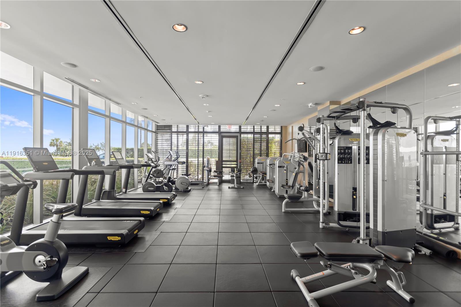 350 Ocean Drive, Unit 904N Key Biscayne, FL 33149 - Photo 35 of 40 a view of a room with gym equipment