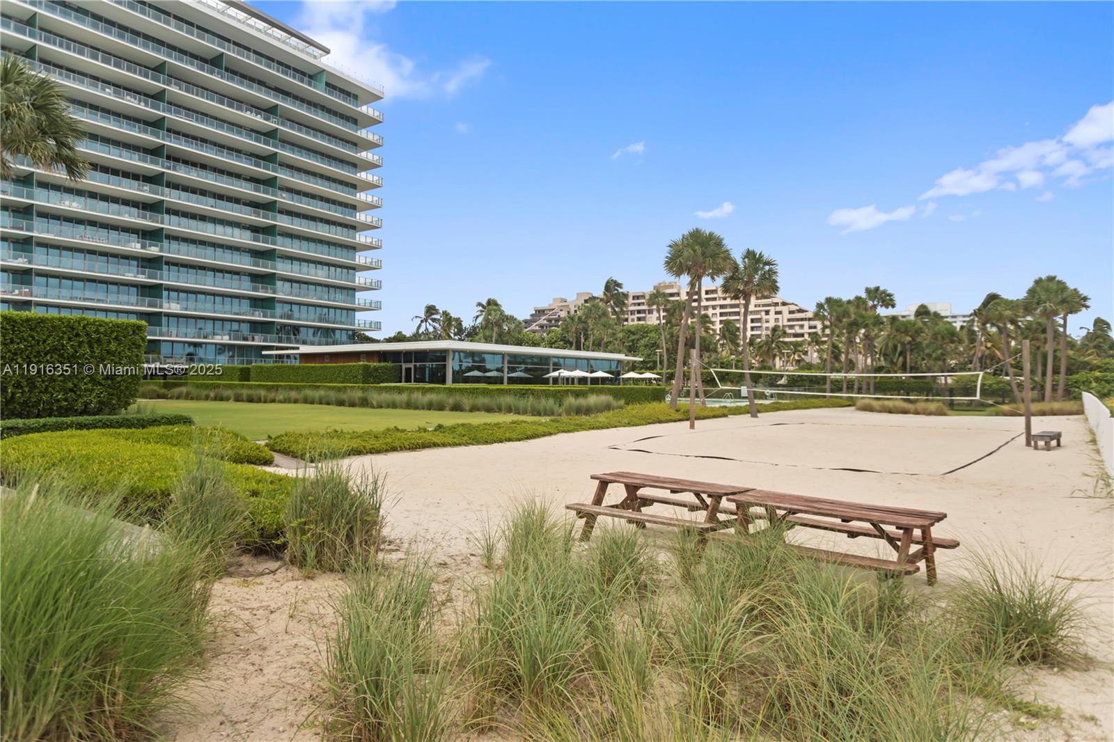 350 Ocean Drive, Unit 904N Key Biscayne, FL 33149 - Photo 37 of 40 a view of a swimming pool with a lake view