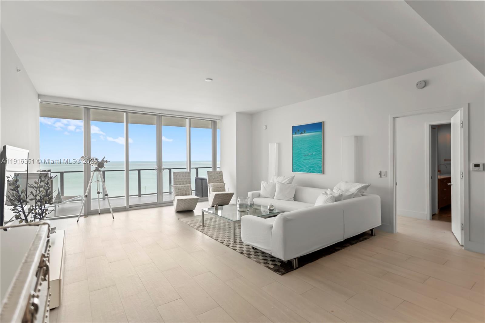 350 Ocean Drive, Unit 904N Key Biscayne, FL 33149 - Photo 7 of 40 a spacious bedroom with a large bed and a large window