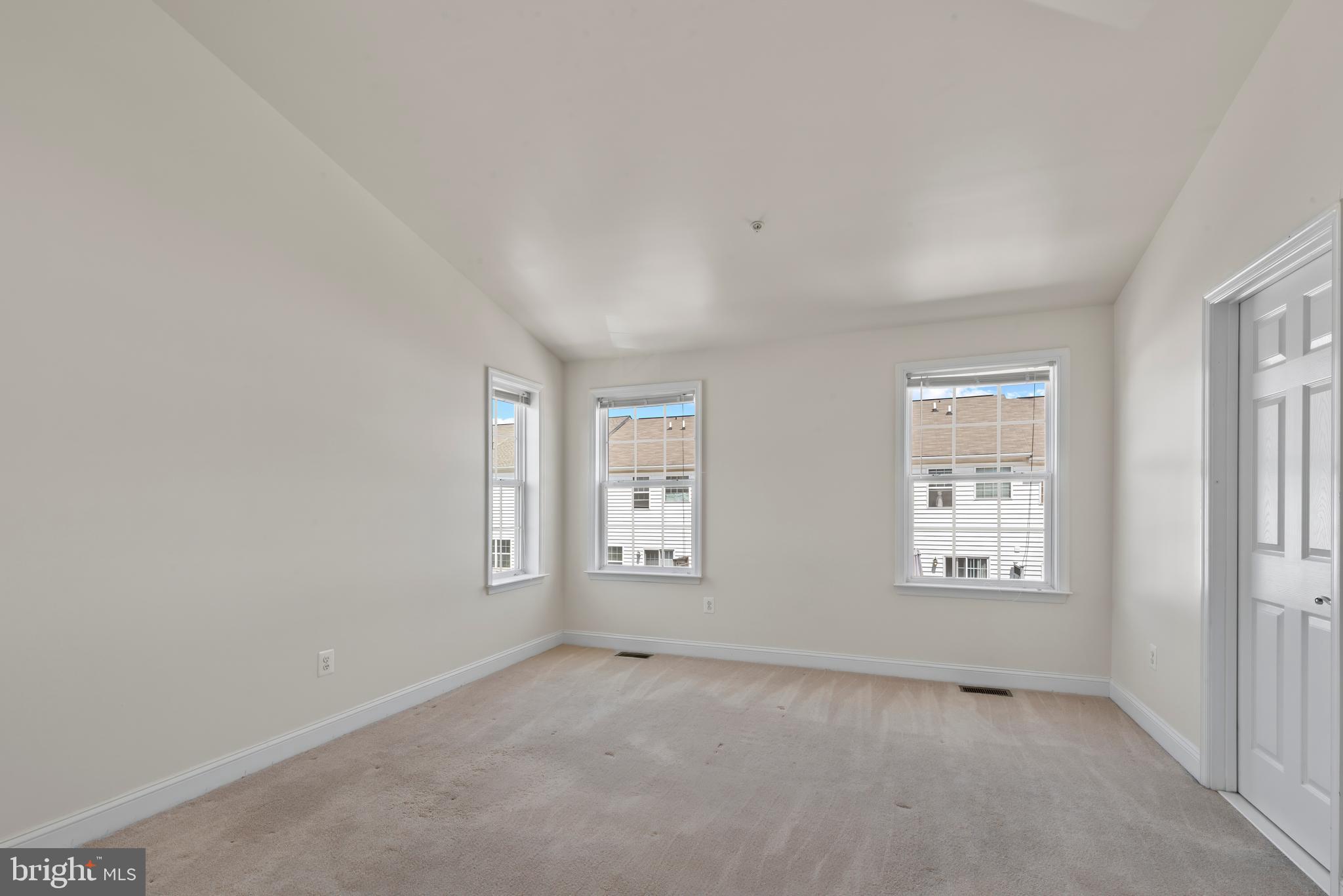 830 Ryan Street Baltimore, MD 21230 - Photo 13 of 24 an empty room with windows and closet