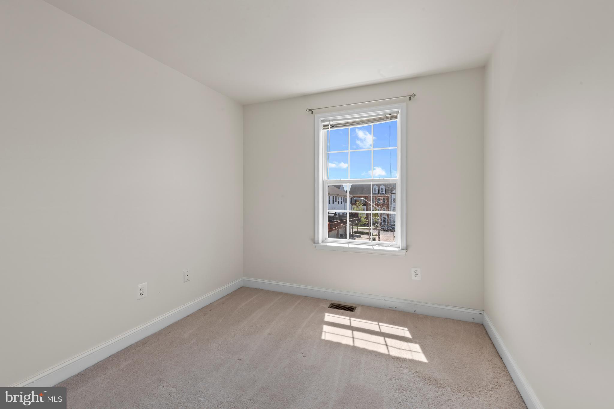 830 Ryan Street Baltimore, MD 21230 - Photo 18 of 24 an empty room with a window