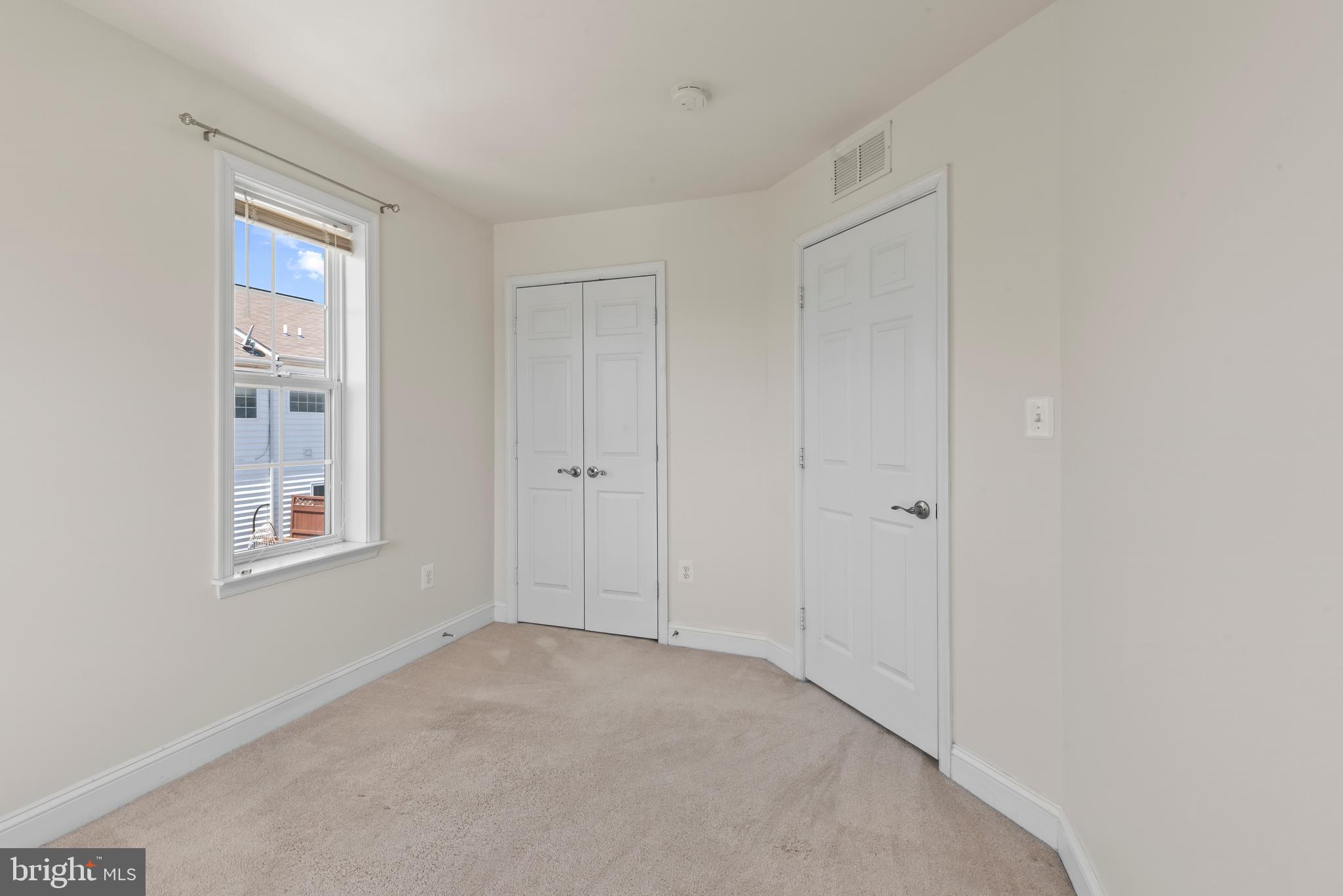 830 Ryan Street Baltimore, MD 21230 - Photo 20 of 24 a view of an empty room with a window