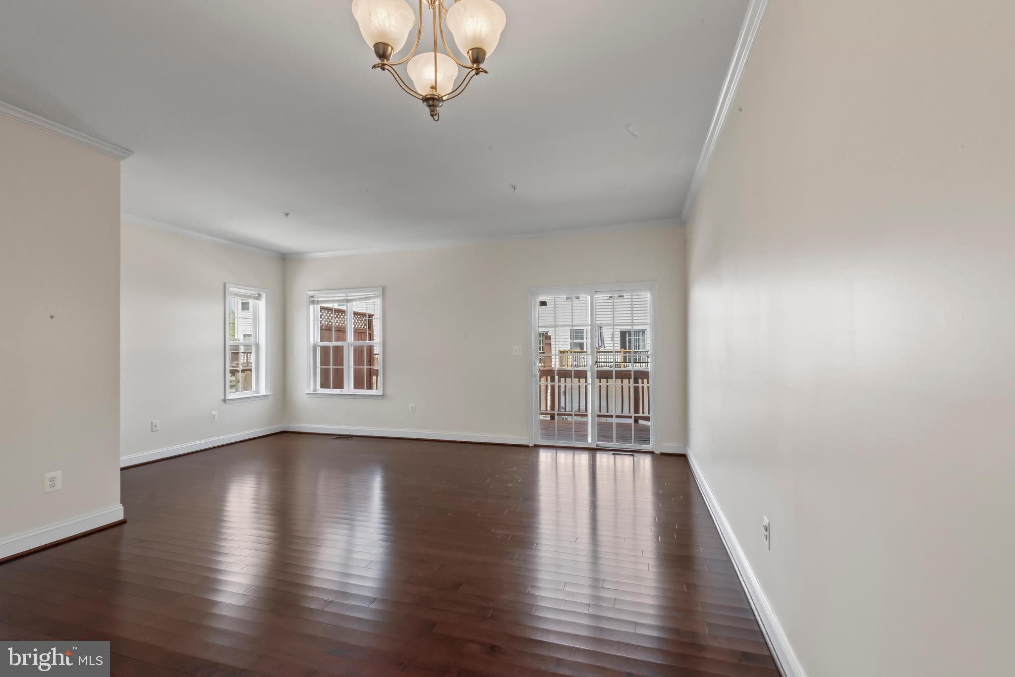 830 Ryan Street Baltimore, MD 21230 - Photo 2 of 24 a view of empty room with wooden floor