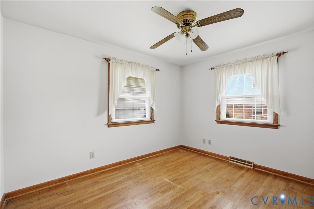 3200 Valleyfield Road Henrico, VA 23228 - Photo 14 of 32 Bright room featuring two windows with wood trim,