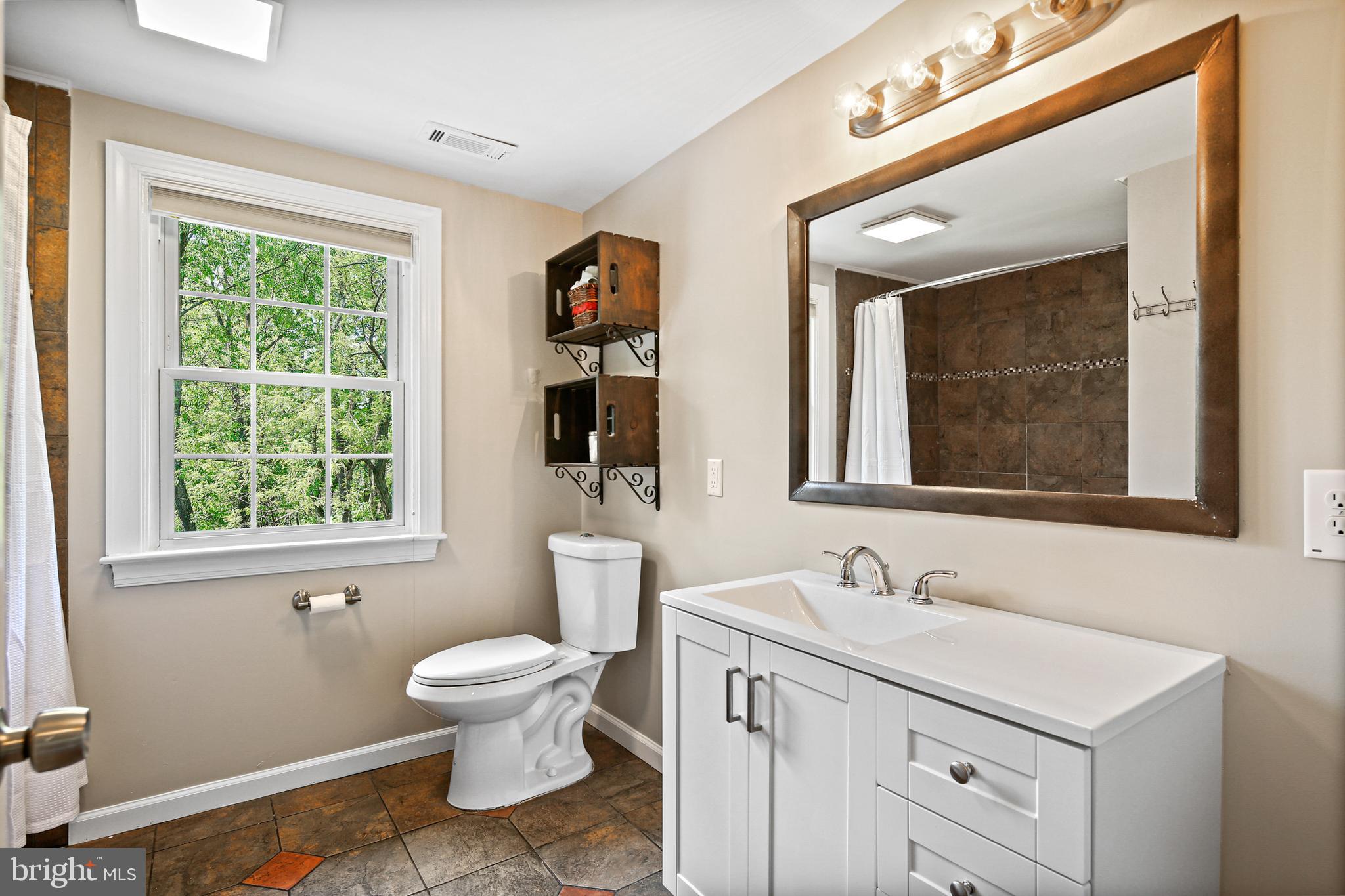 6930 Montgomery Road Elkridge, MD 21075 - Photo 23 of 34 Upper Level Full Bath w/ Tile Flooring
