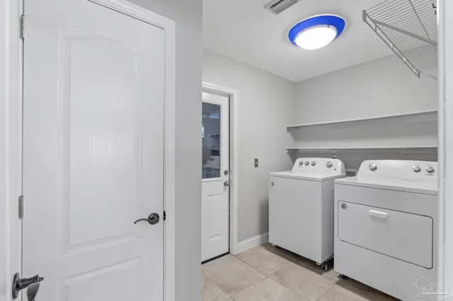 a view of utility room with washer and dryer