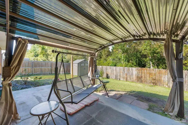 a garden view with a seating space