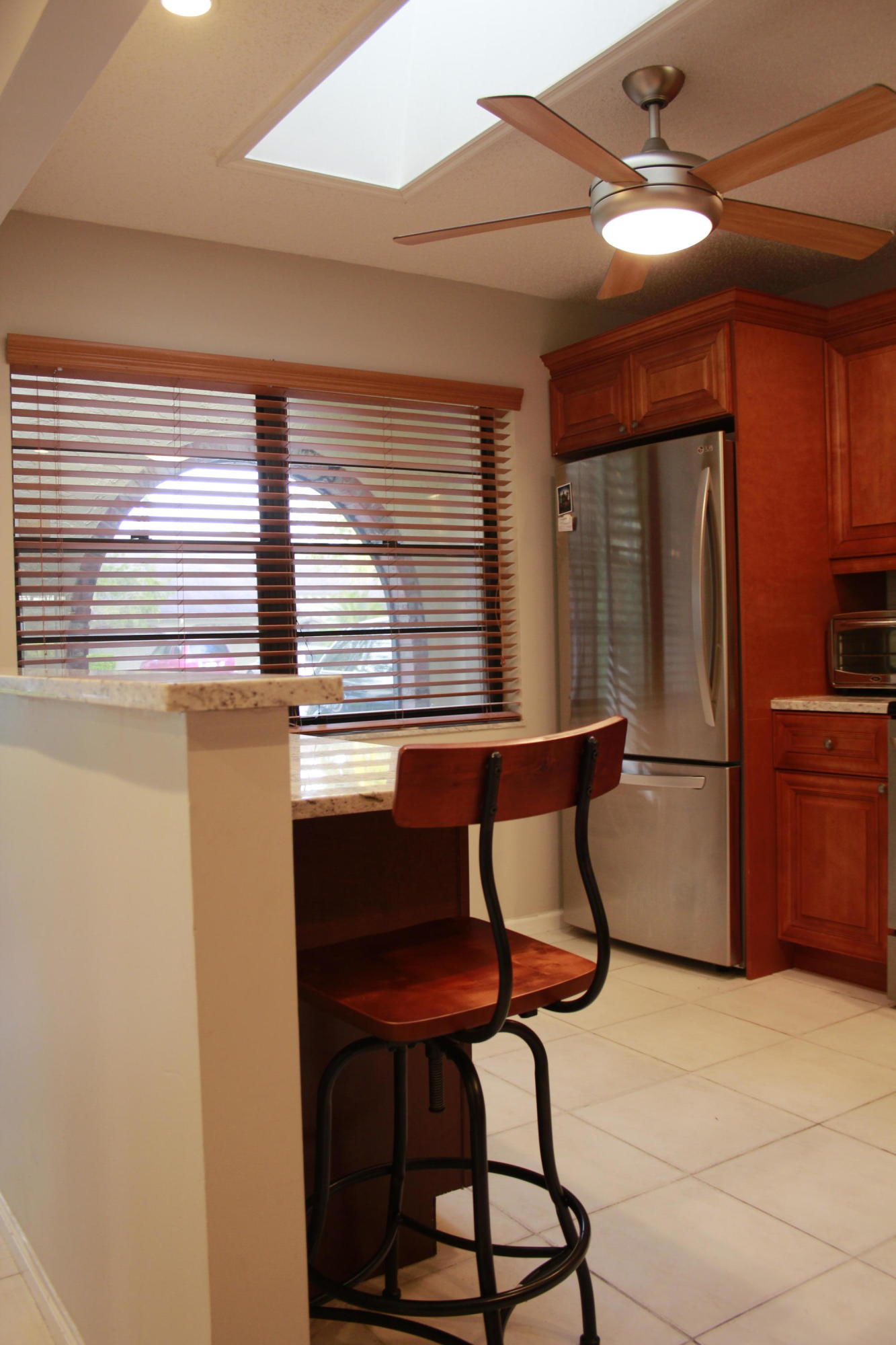 8986 Southwest 19th Street, Unit B Boca Raton, FL 33433 - Photo 11 of 55 a dining room with furniture and window