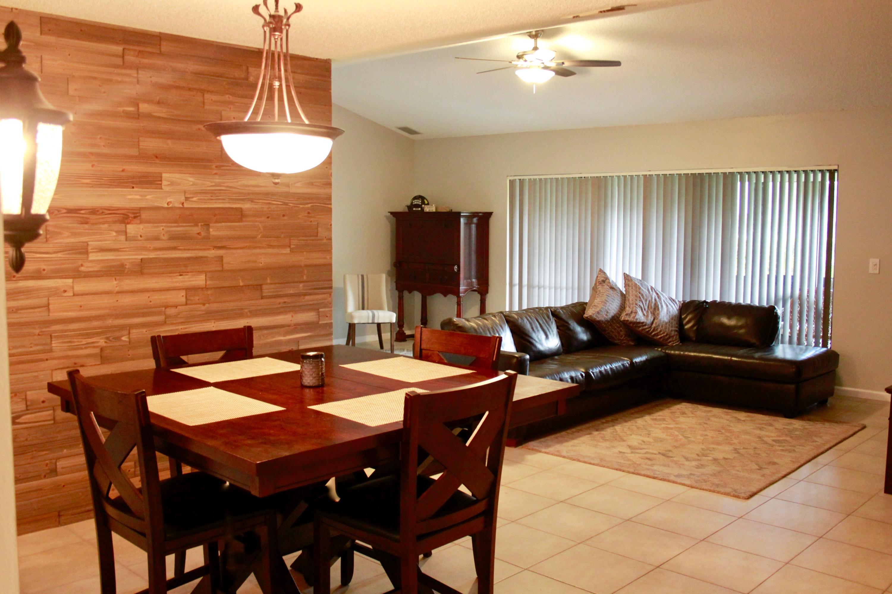 8986 Southwest 19th Street, Unit B Boca Raton, FL 33433 - Photo 12 of 55 a view of a dining room with furniture