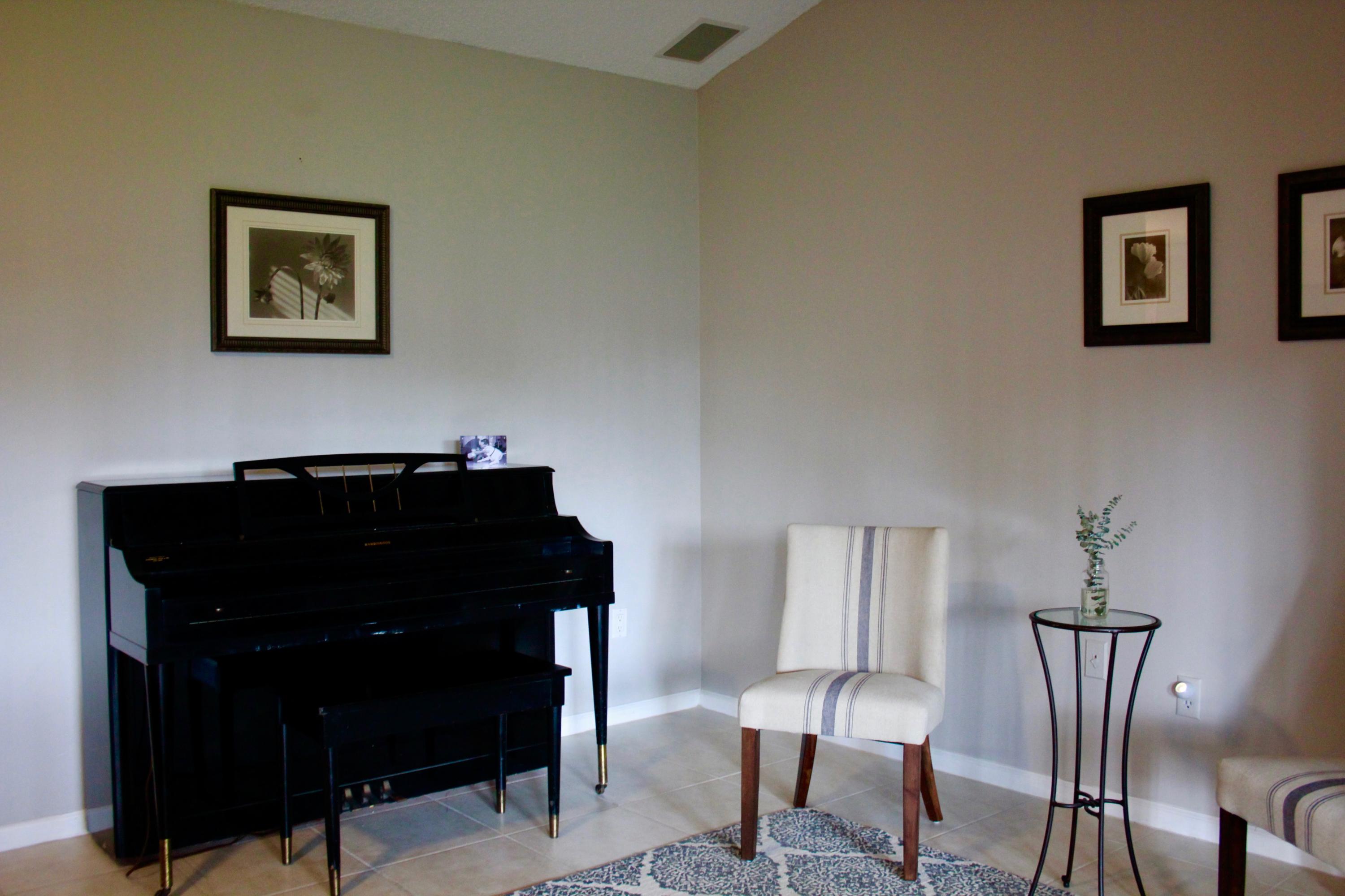 8986 Southwest 19th Street, Unit B Boca Raton, FL 33433 - Photo 20 of 55 a view of a workspace with furniture and lamp