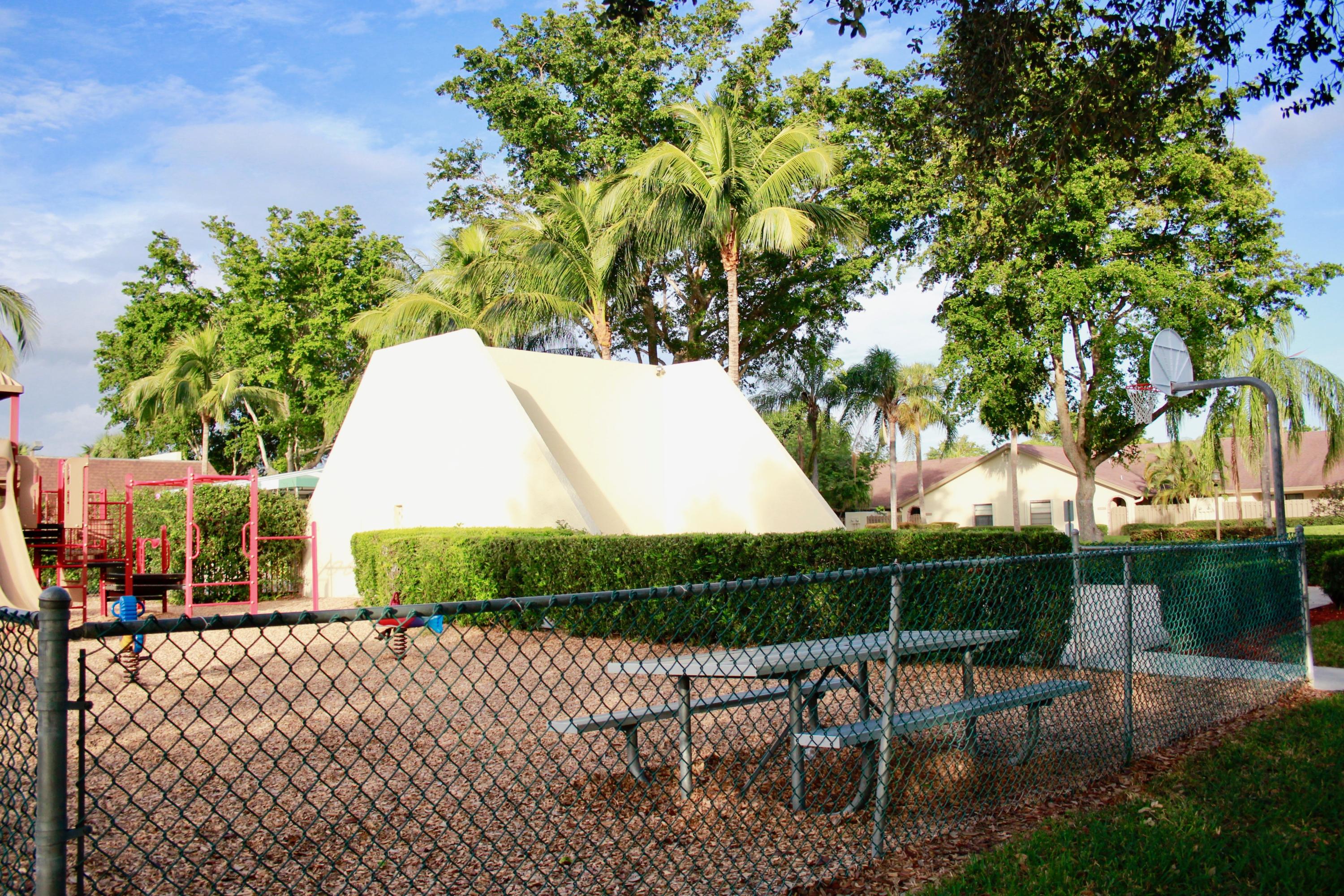 8986 Southwest 19th Street, Unit B Boca Raton, FL 33433 - Photo 53 of 55 a view of a backyard