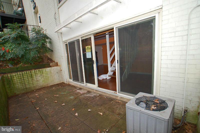 8622 Manchester Road, Unit 3 Silver Spring, MD 20901 - Photo 22 of 23 a view of a porch with potted plants