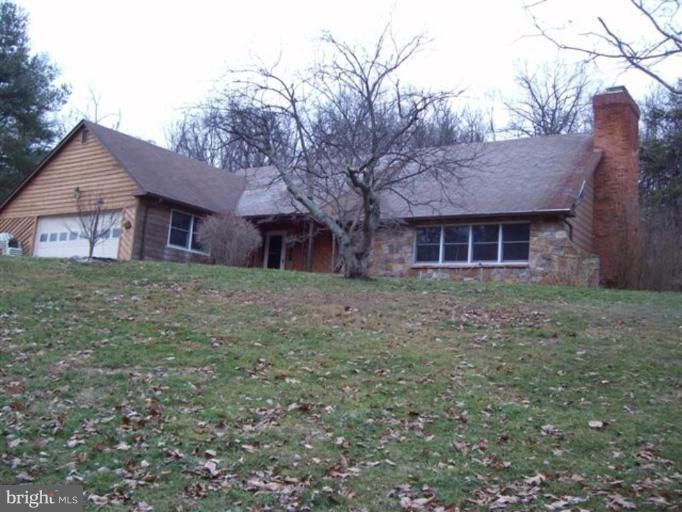 514 Redland Road Cross Junction, VA 22625 - Photo 2 of 24 a view of a house with a yard