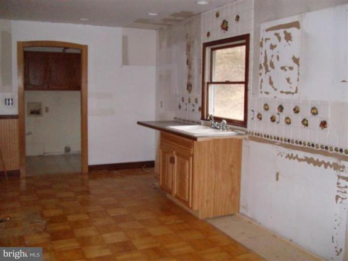 514 Redland Road Cross Junction, VA 22625 - Photo 12 of 24 a view of cabinets with wooden floor