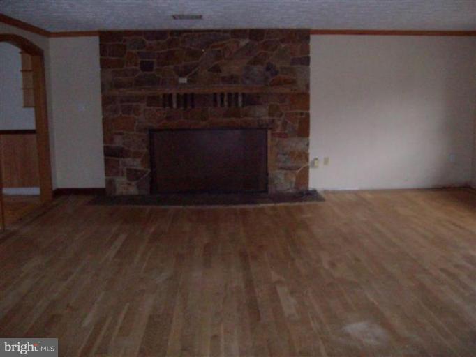 514 Redland Road Cross Junction, VA 22625 - Photo 14 of 24 a living room with a fireplace