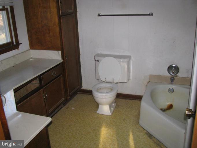 514 Redland Road Cross Junction, VA 22625 - Photo 17 of 24 a bathroom with a sink toilet and shower