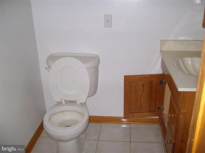 514 Redland Road Cross Junction, VA 22625 - Photo 19 of 24 a bathroom with a sink and a toilet